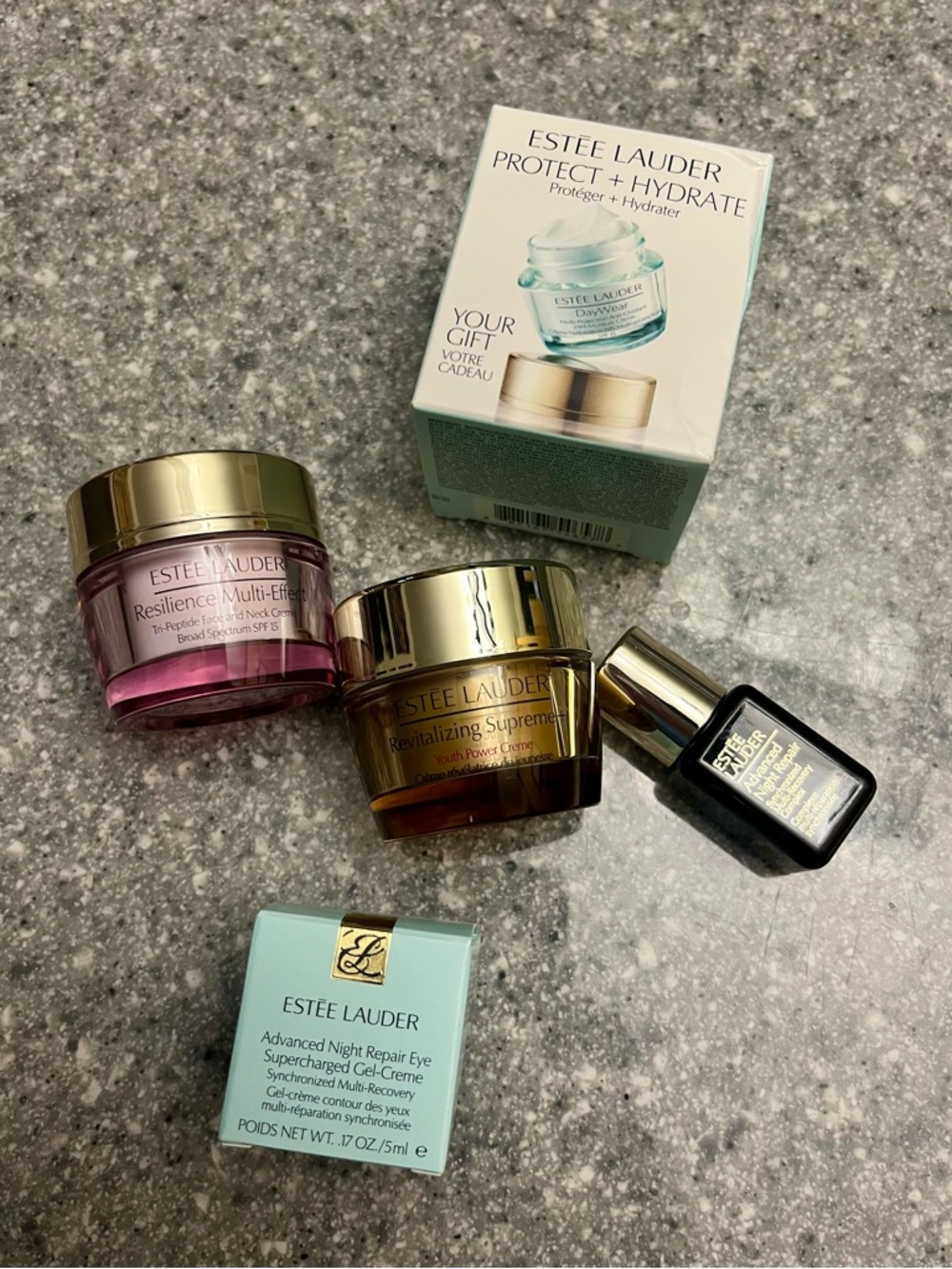 Estee Lauder Skincare Set - Pink, Gold, Aqua, Black